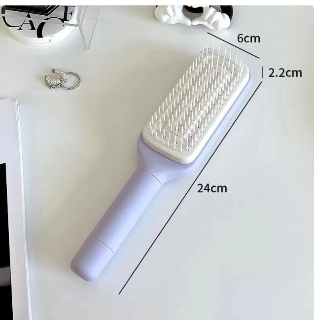 4-in-1 self-cleaning hair brush with measurements, designed for detangling and smoothing hair.